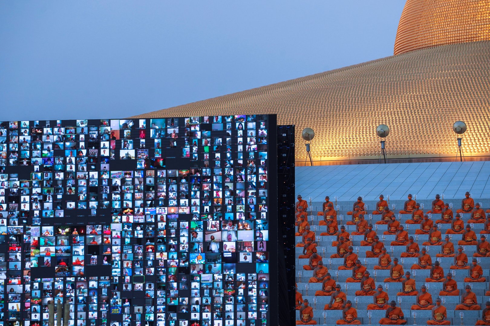 image Temple of Zoom: 200,000 Thai Buddhists mark holy day via video link